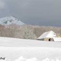 Chaumiere sous la neige
